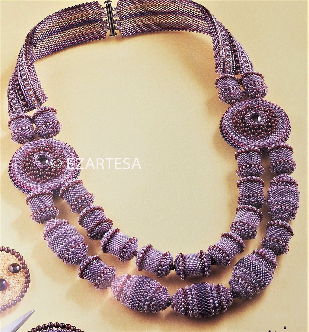 This gorgeous statement necklace is created by using natural, excellent clarity Garnet cabochons and beads, You can buy this stunning “Purple Love” Necklace there.