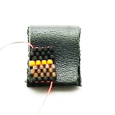 Step 2: Work in flat, even-count peyote stitch to make a strip that is eight beads wide and forty-three or more rows tall. necklace-tutorial-seed-beads-leather