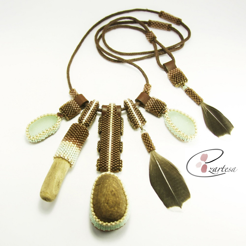 Bring a hint of coastal flair to any of your summer outfits with this cool color combination Sea Glass Necklace by Ezartesa.